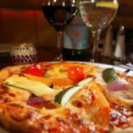even pizza is spectacular with fine wines